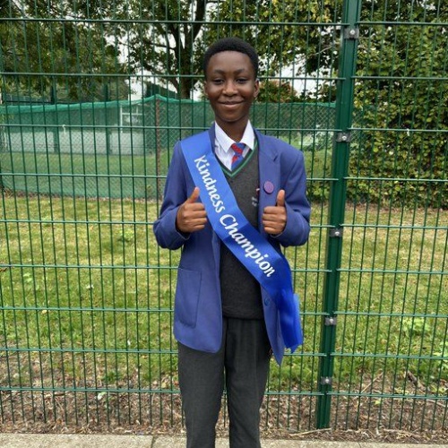 Student wearing a kindness champion sash