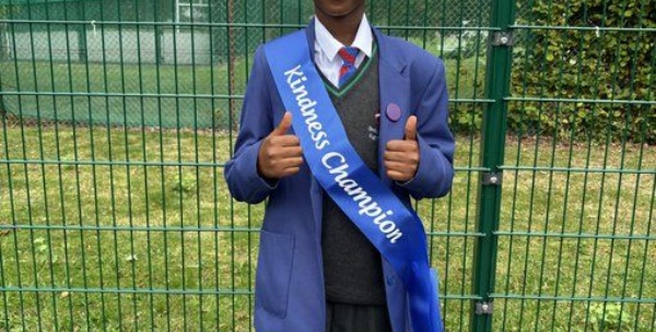 Student wearing a kindness champion sash